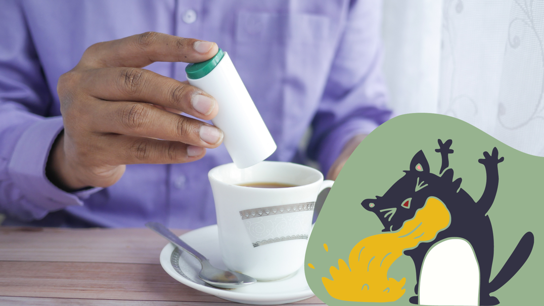 Someone putting sweetener in coffee with cartoon cat vomiting in corner